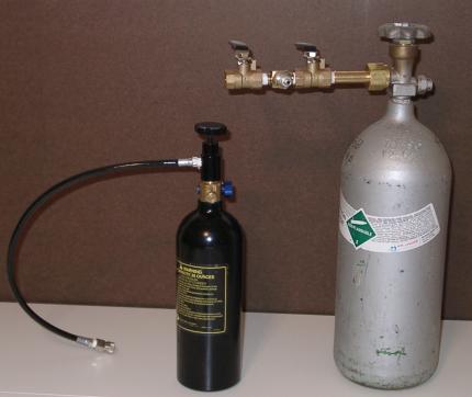 small and big CO2 tanks with filling adaptors